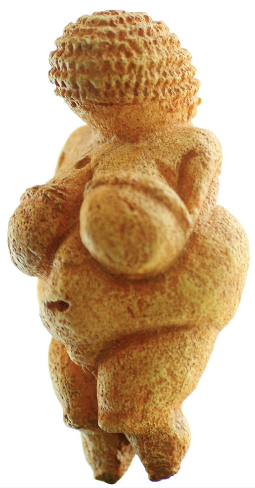 Eine kleine, antike Figur mit betonten weiblichen Merkmalen, möglicherweise aus der Steinzeit.