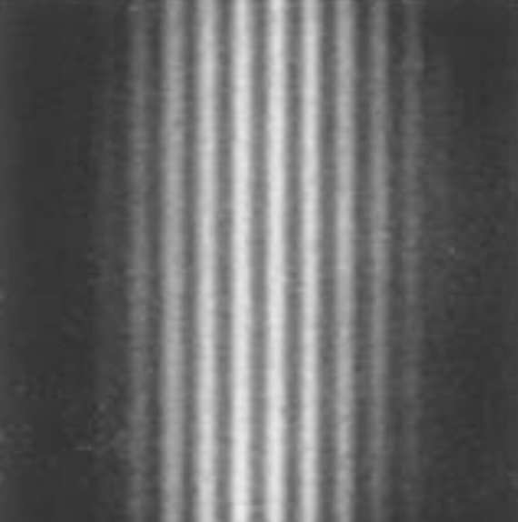 Vertikale helle und dunkle Streifen auf grauem Hintergrund.